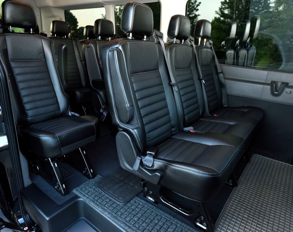 The Art of Drawing Readers In: Your attractive post title goes here Luxurious black leather seating inside a spacious minivan with ample legroom.